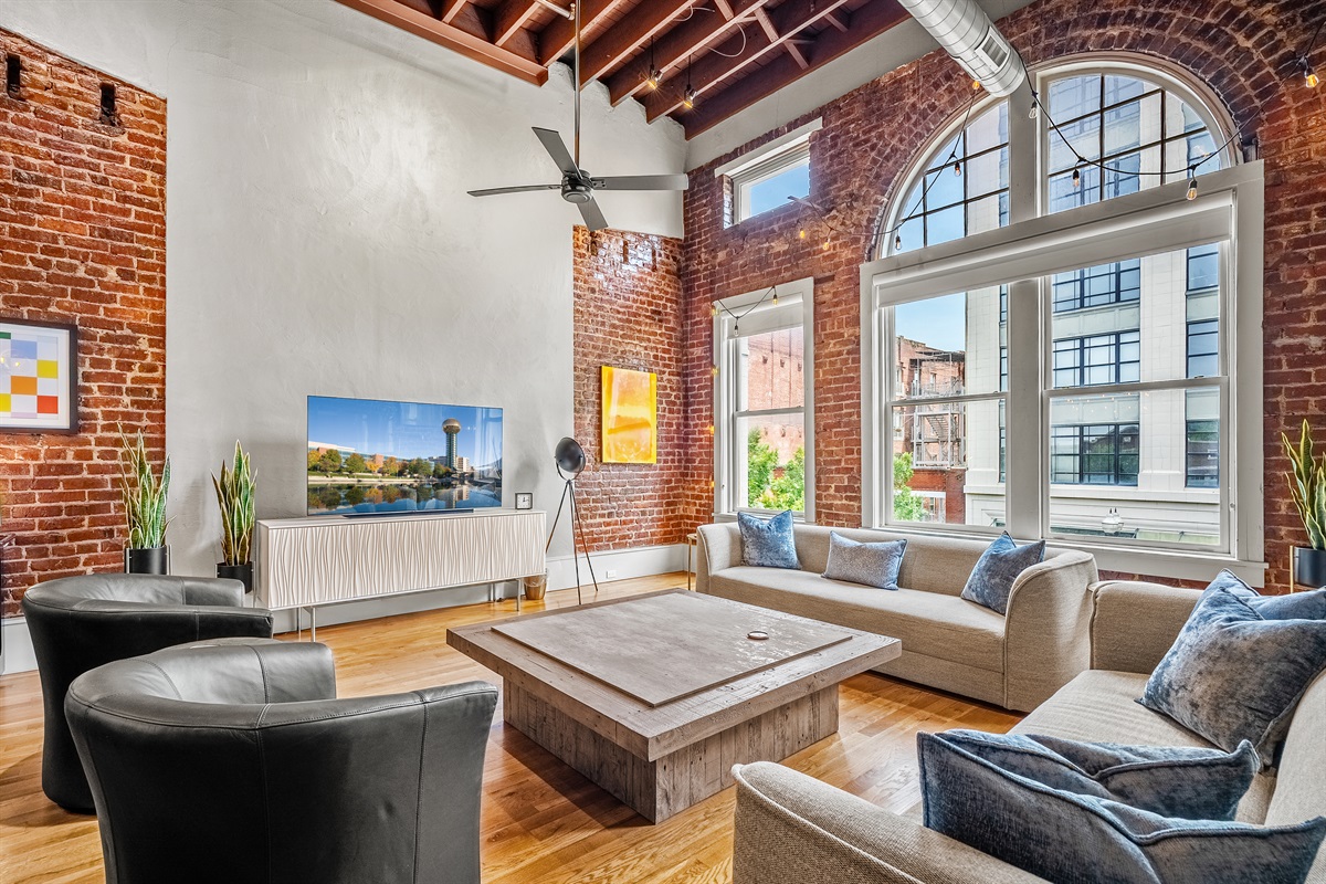 Gather in comfort with plenty of natural light and downtown views.