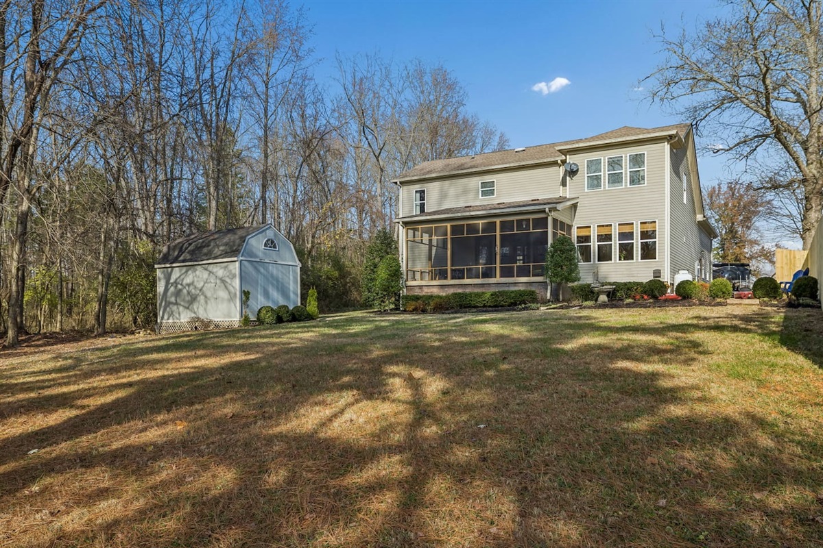 Close view of Screen Porch and back of house.