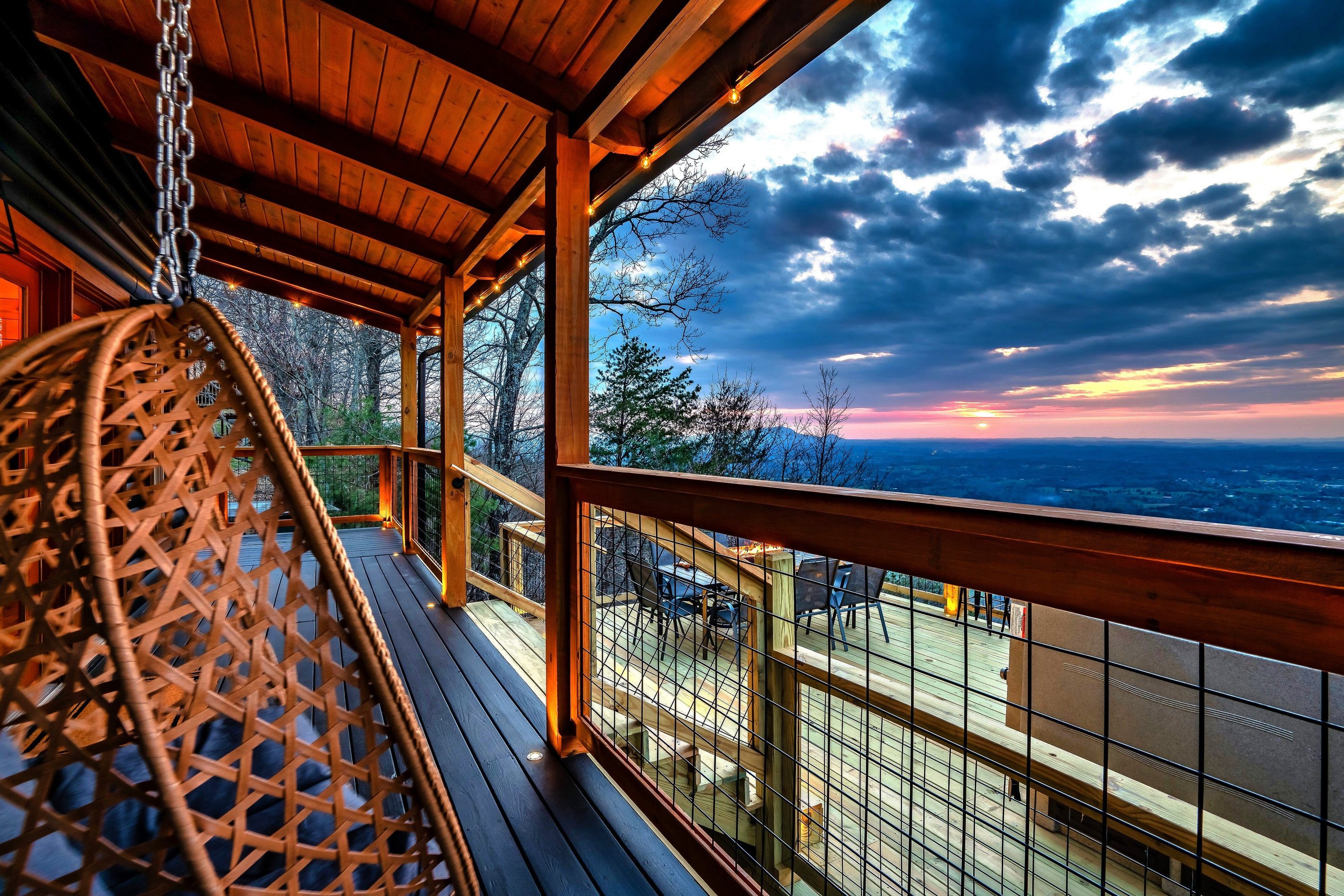 The best front-row seats to Smoky Mountain sunsets. These 2 egg chairs are perched on the deck overlooking stunning mountain views. 