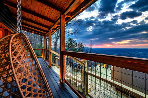 The best front-row seats to Smoky Mountain sunsets. These 2 egg chairs are perched on the deck overlooking stunning mountain views. 