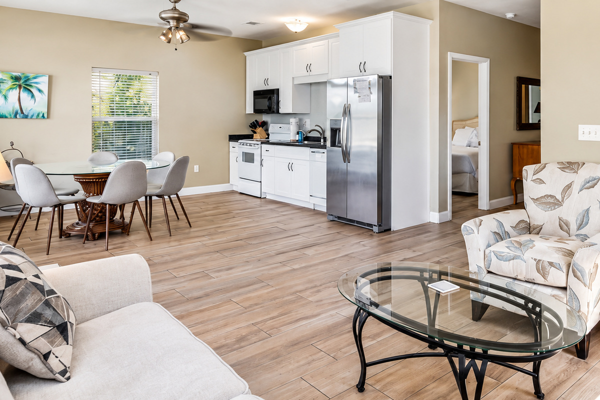 First Floor: Bright open-concept with a full kitchen, comfortable living area, and dining space.