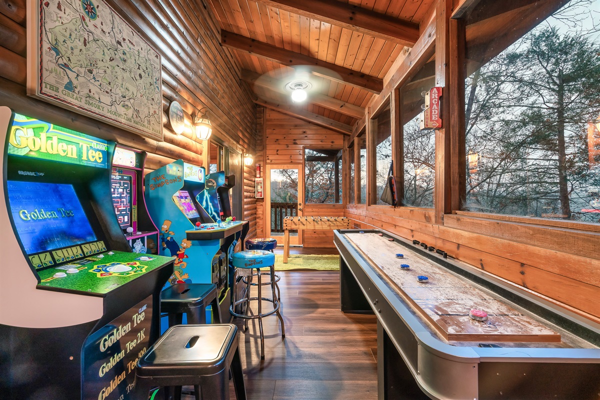 endless amounts of fun in our game room- shuffleboard, pac man, golden tee, mortal combat, foosball, and a full sized driving game