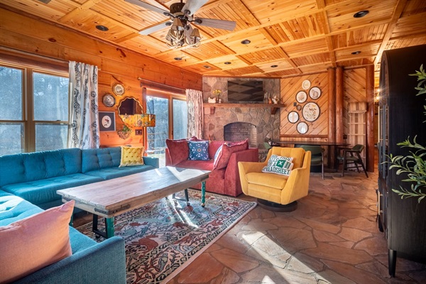 Living space with games and sleeper sofa on bottom floor. 