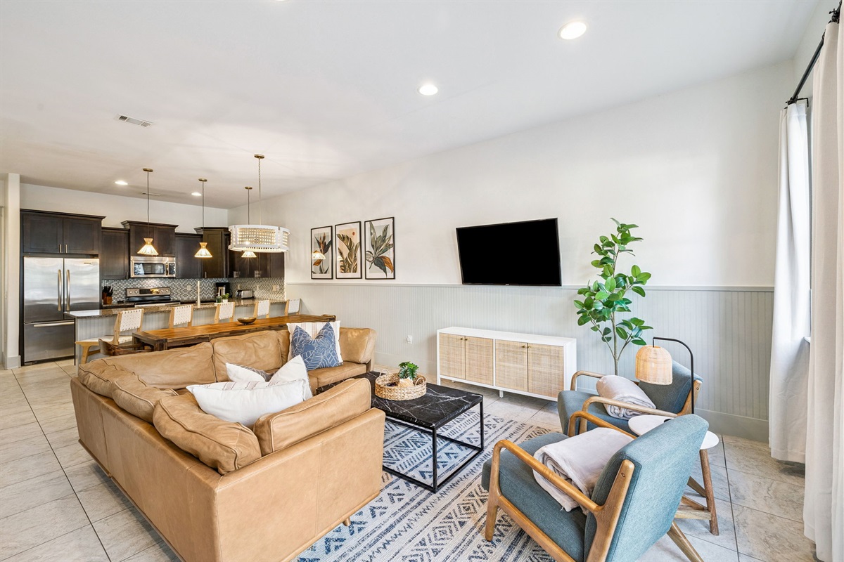 A bright and modern living space flows effortlessly to the backyard pool, offering the best of both worlds. Throw open the doors, enjoy the fresh breeze, and experience a true vacation vibe from the comfort of home.