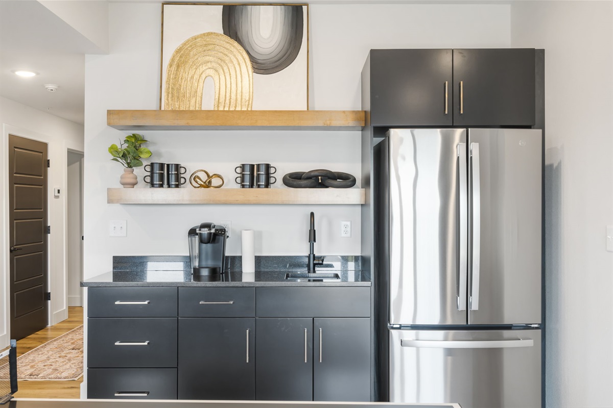 Lower game level wet bar and fridge