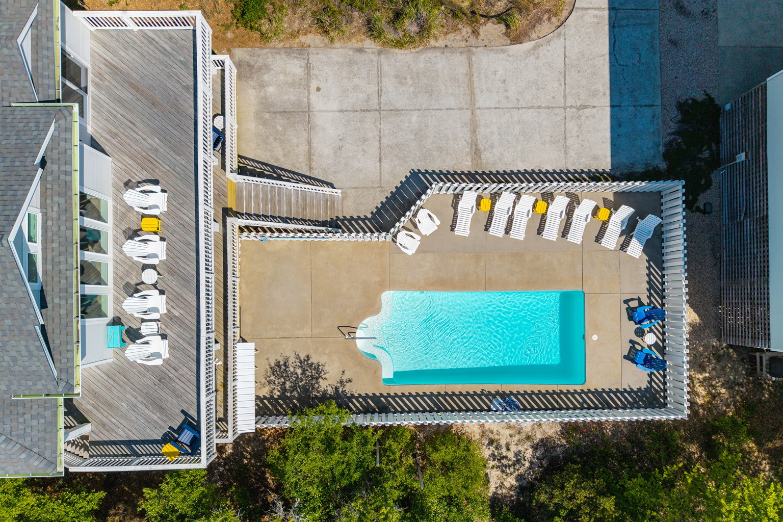 Aerial view of the fenced private pool area with plenty of room to lounge.