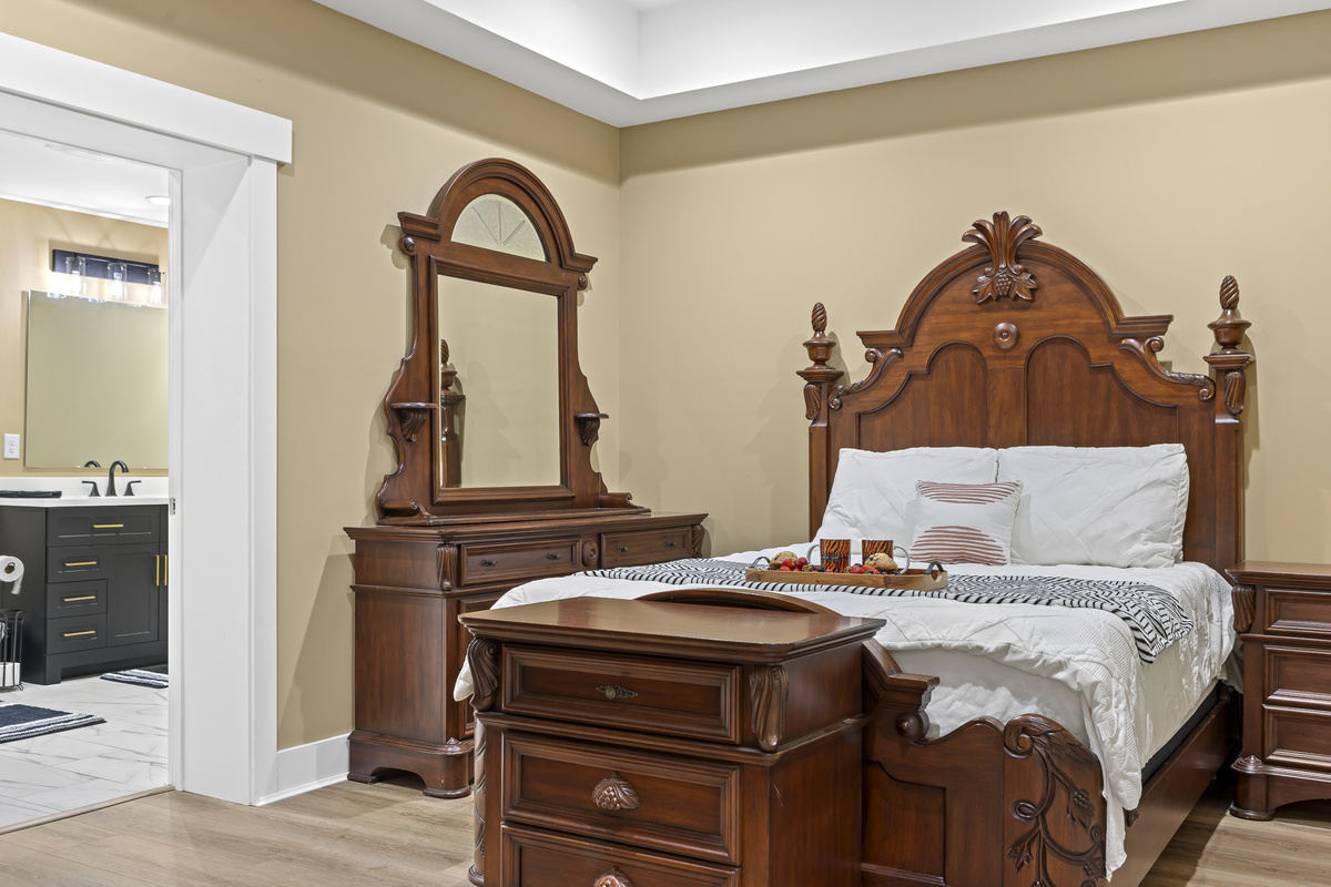 Elegant Bedroom: Indulge in luxury with classic furnishings and serene vibes for a restful escape!
