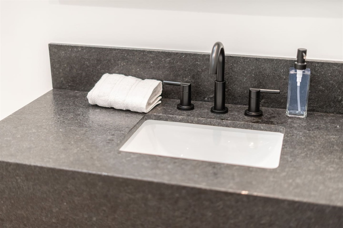 Perfectly placed powder room for quick freshening up during your stay.