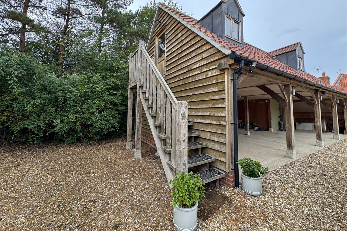 The Rookery entrance up the wooden staircase