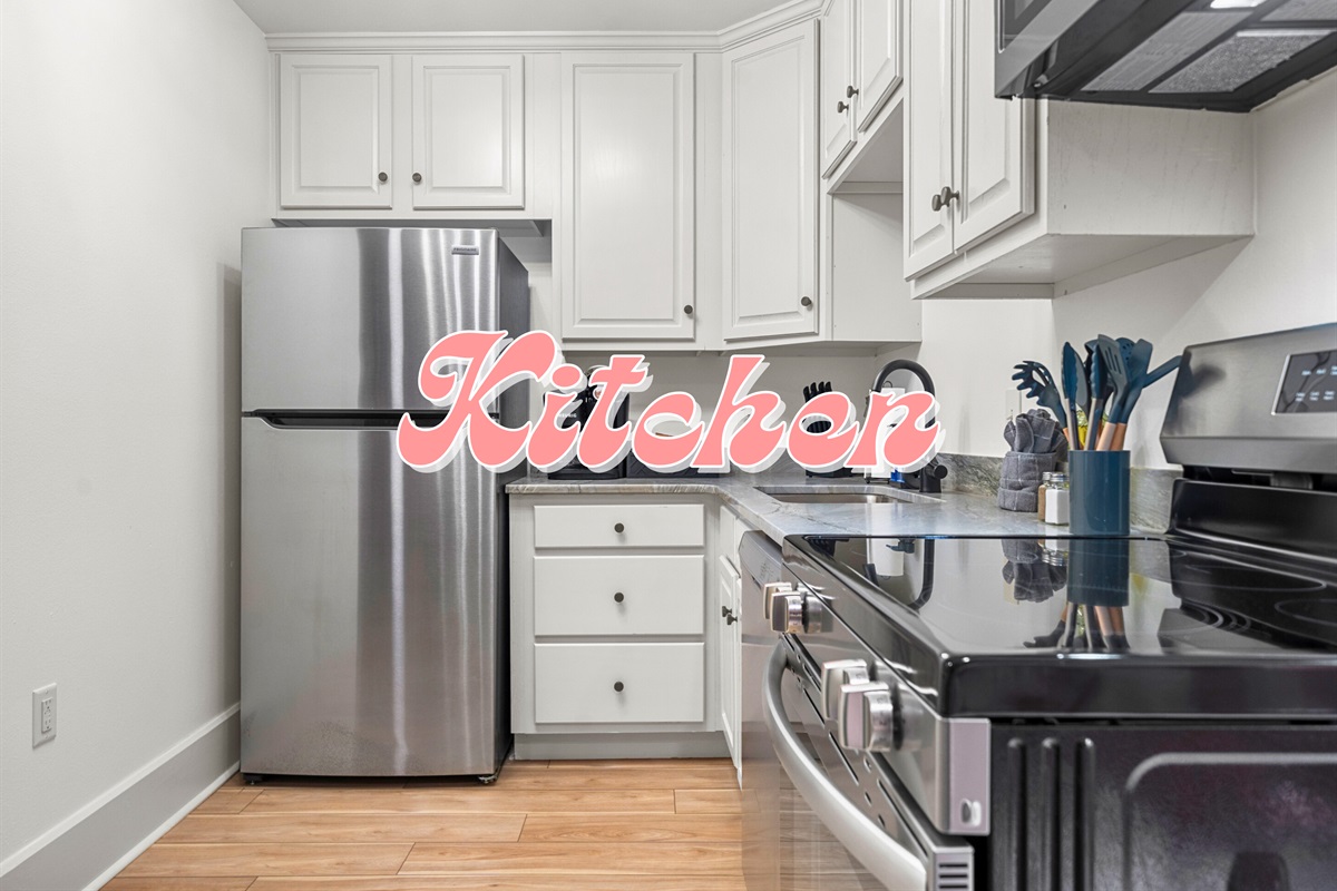 A fully equipped kitchen with stainless steel appliances and just the right amount of counter space makes meal prep a breeze, whether you're cooking a feast or a quick snack.