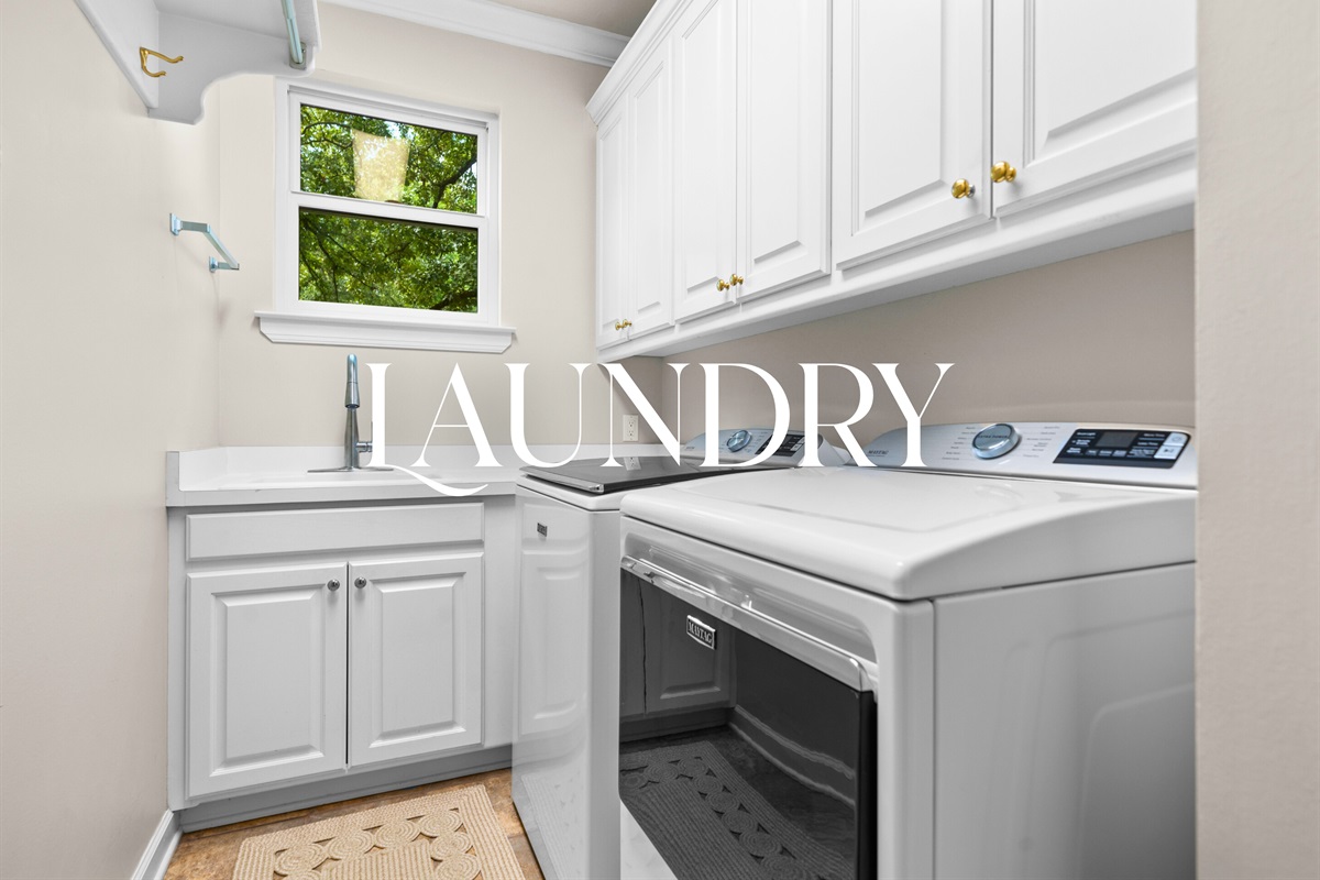 Laundry Room: Bright, spacious, and fully equipped for your convenience.