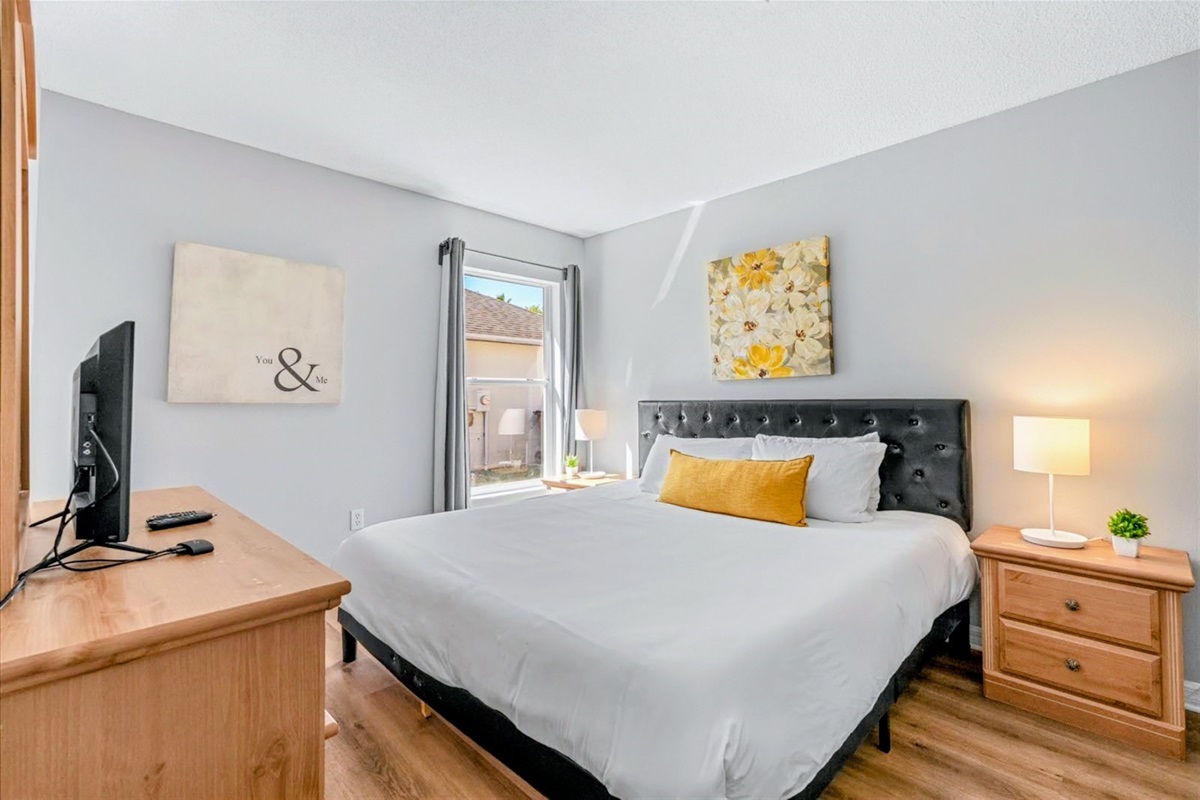 The fourth bedroom is at the end of the hall, passing the kids bedrooms, and has its own TV and an ensuite full bathroom