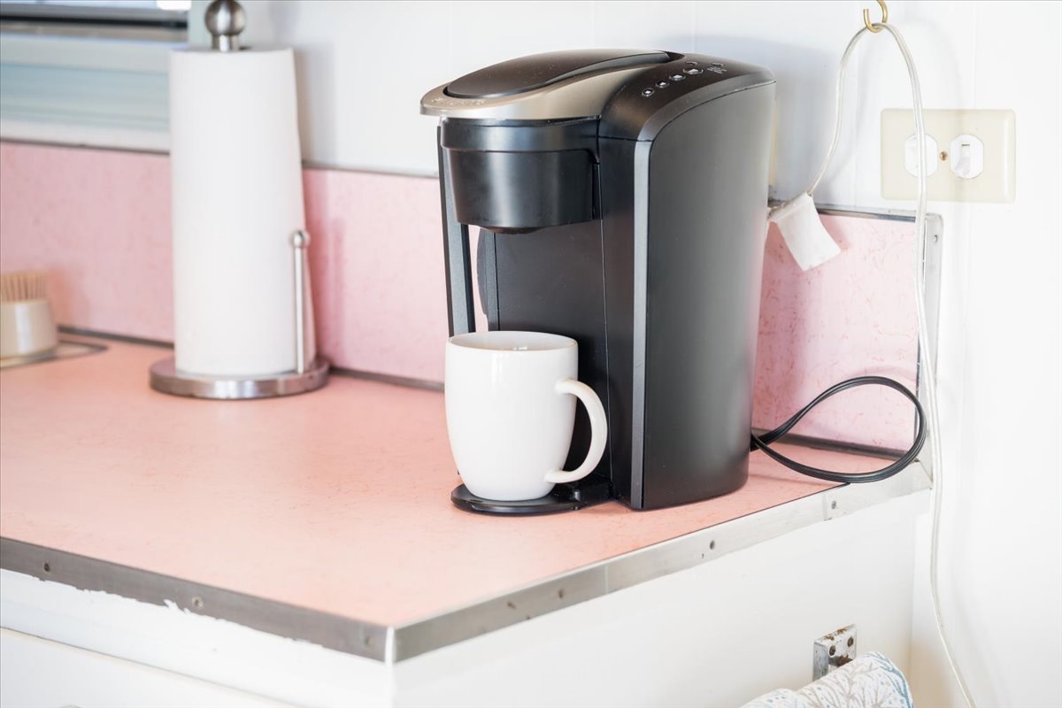 Kitchen equipped with Keurig coffee maker