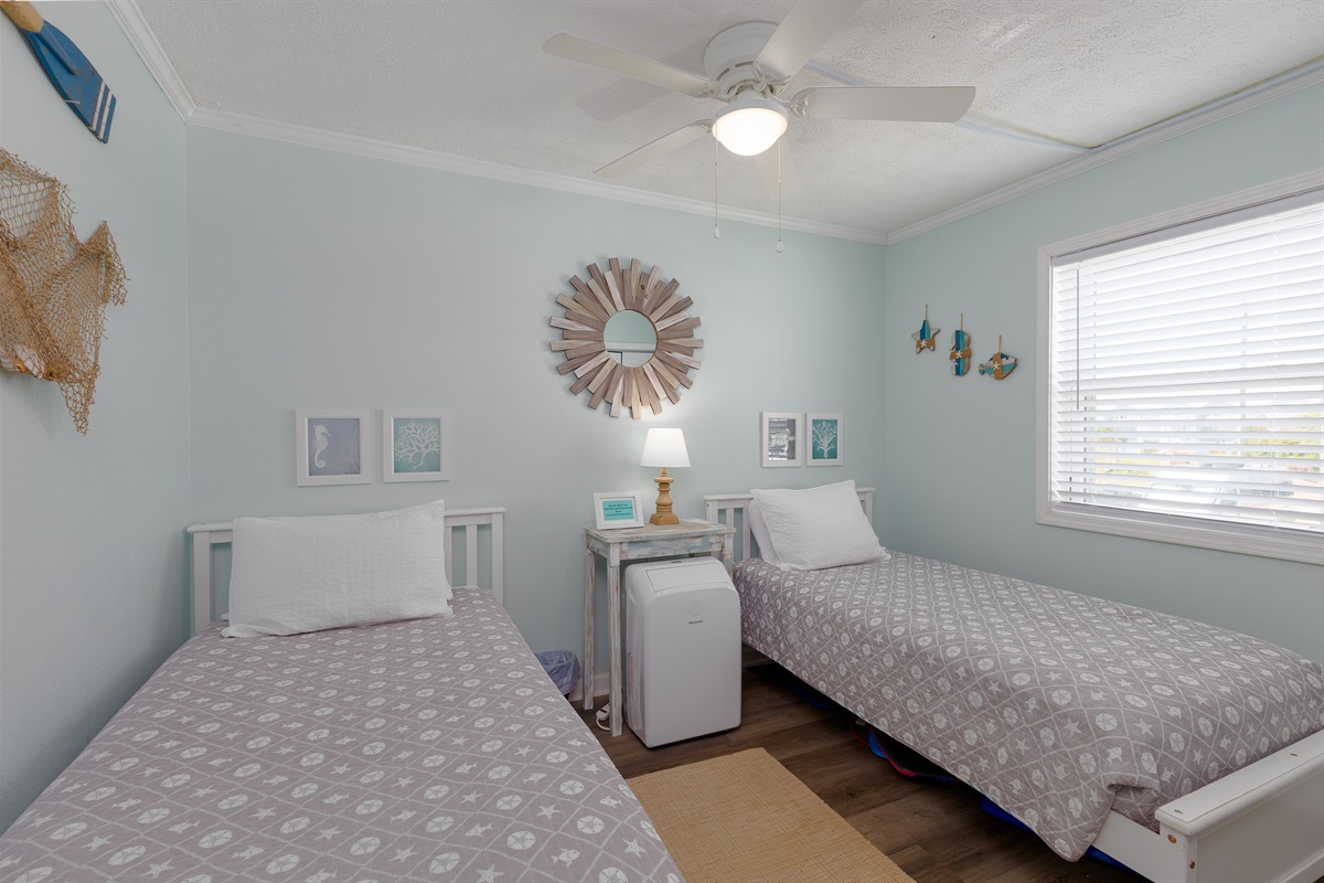 2 Twin size beds in second bedroom