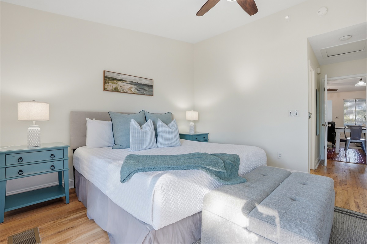 Bedroom #1 with King Bed and Balcony Access Overlooking the Back Yard