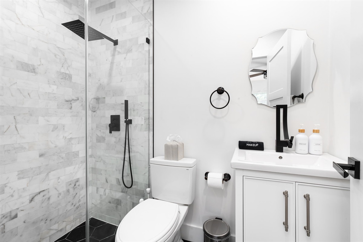 Spacious en suite bathrooms with sleek finishes and hotel-style touches.