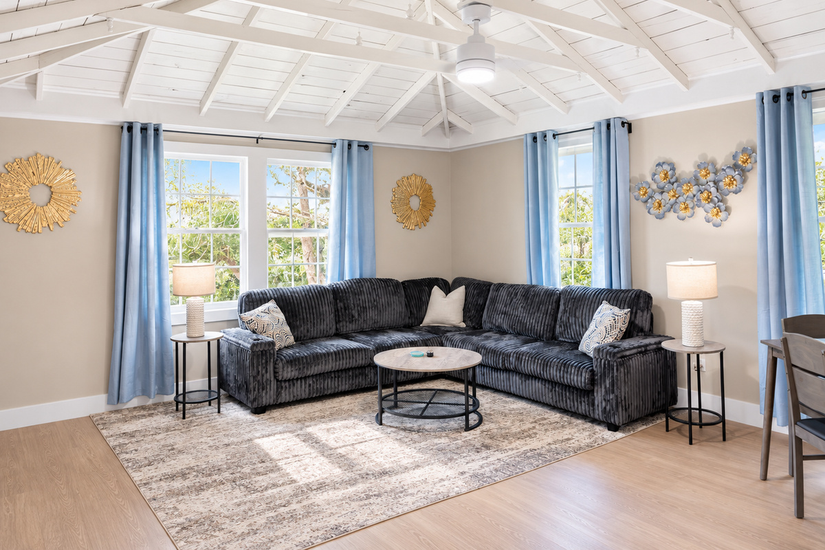 Bright, airy lounge with vaulted ceilings and plush seating to unwind.