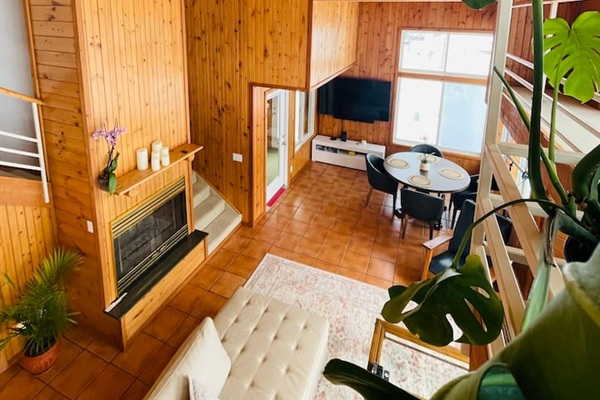 Cozy seating area with fireplace — perfect for relaxing evenings.