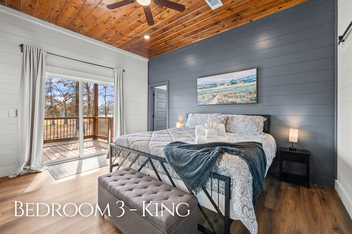 This king bedroom feels warm and inviting, offering a comfortable place to unwind and enjoy a quiet night&rsquo;s sleep.