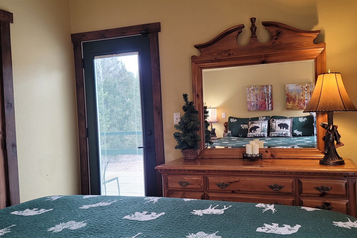 King size bed with access to the wraparound deck