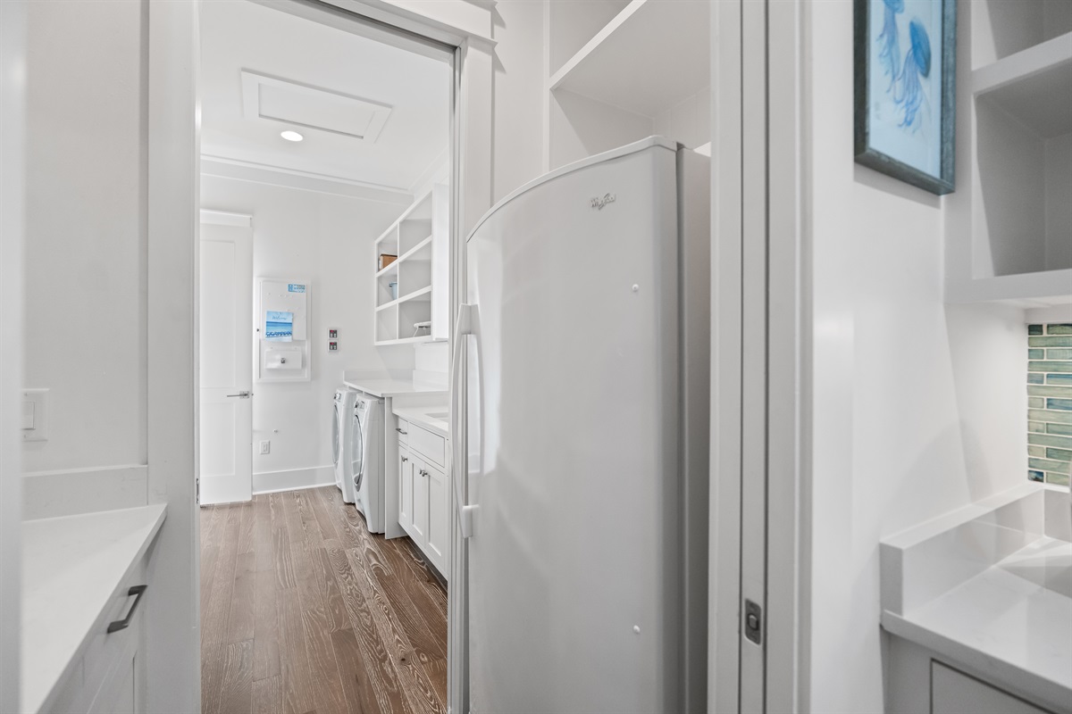 Don't we all need that extra refrigerator on vacation for all of the cold beverages?  The butler's pantry offers more cold space for your groceries in addition to counter/storage space for your groceries. 