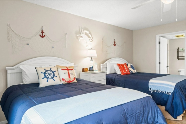 Guest bedroom with two queen beds