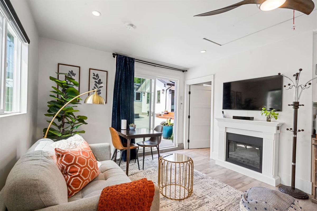 Our cozy living space with a huge smart Samsung TV with all the streaming sites available for you to enjoy your favorite TV series or any movie you like.