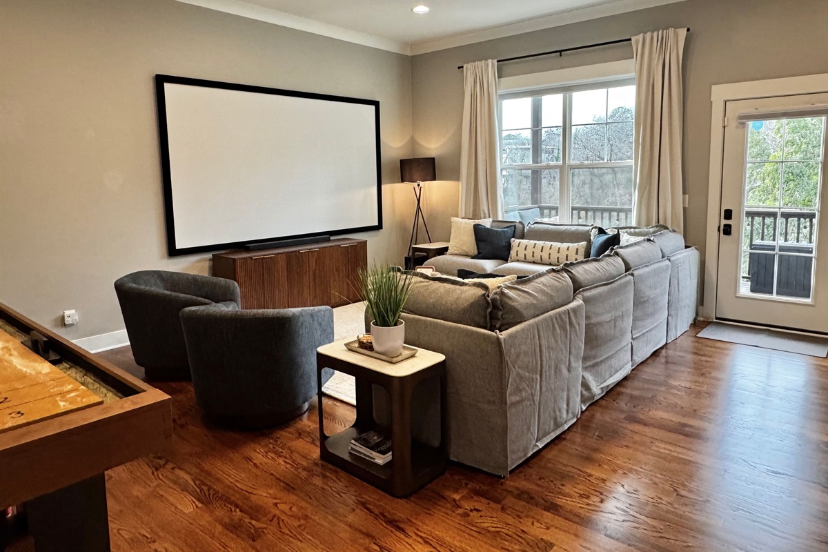 Made for fun and relaxing with a shuffleboard, vintage arcade, and huge projector screen for your epic movie nights!