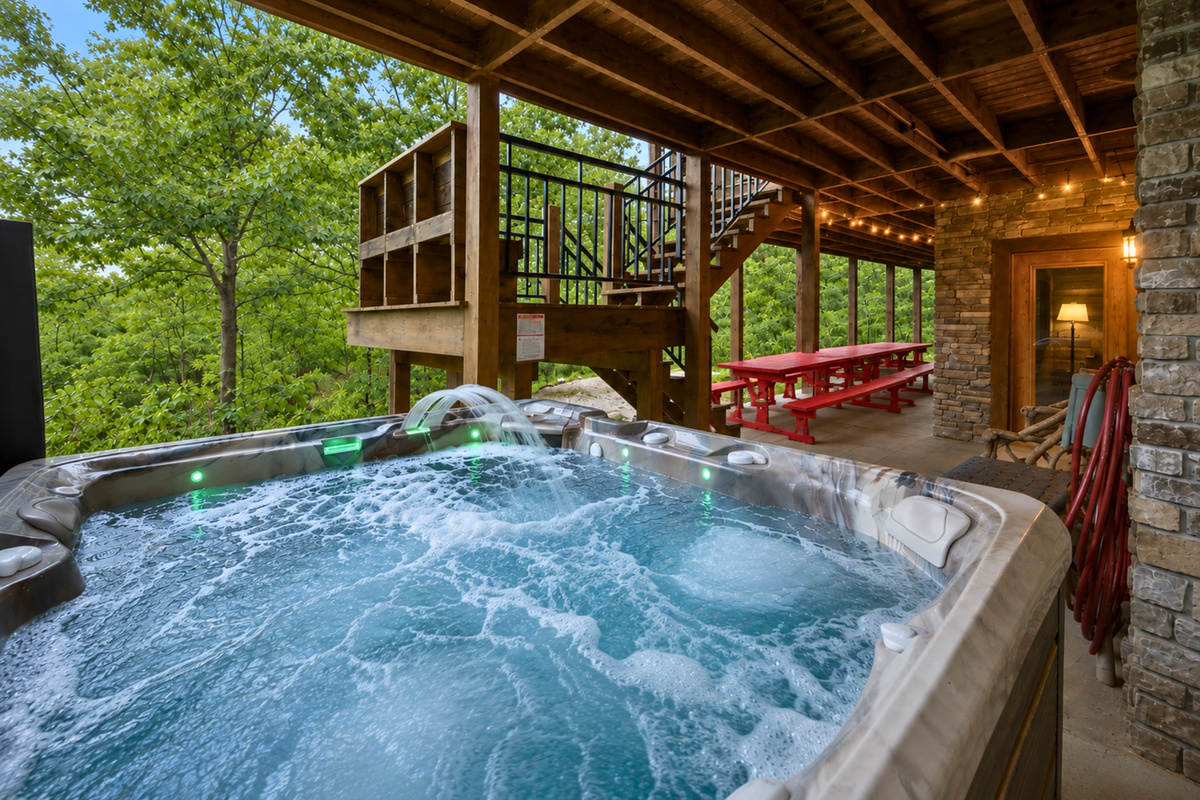 Surrounded by the peaceful woods, the bubbling hot tub offers a relaxing place to soak and unwind after a full day of exploring the area.