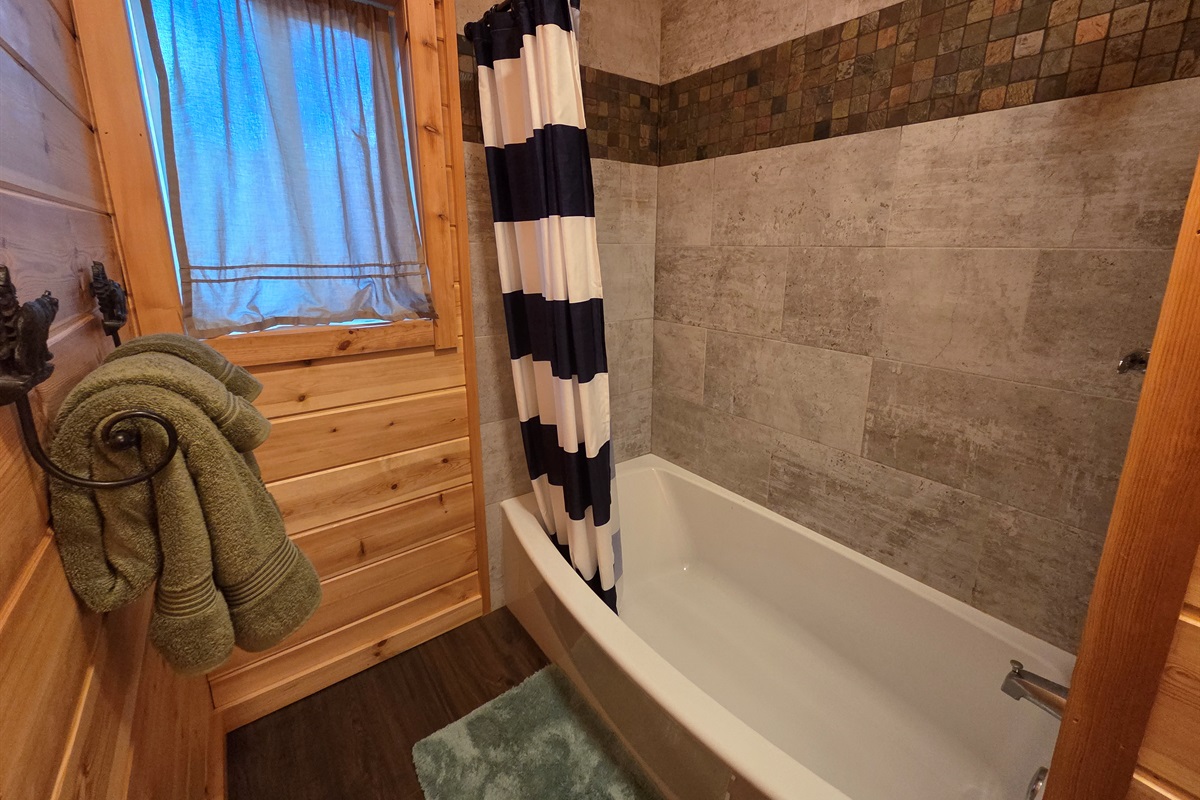 Upstairs, a full bathroom is centrally located between the bedrooms for added convenience