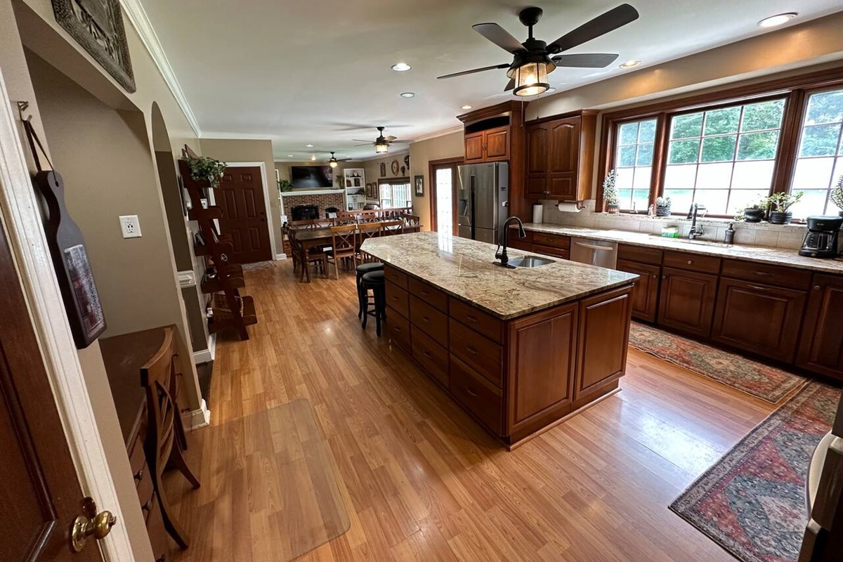 view from kitchen to large nook and large family room