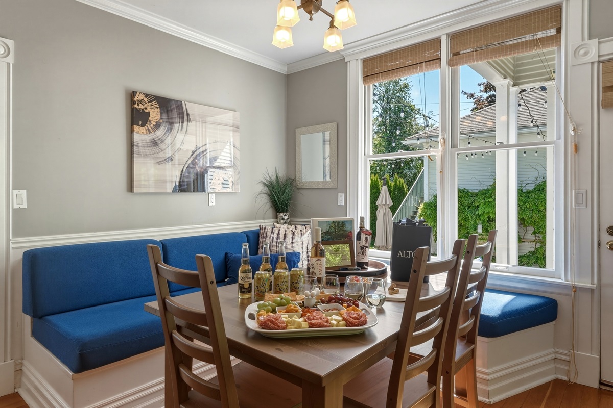 Enjoy casual mornings or afternoon hangouts in the charming breakfast nook, adjacent to the kitchen and wood stove (firewood provided)