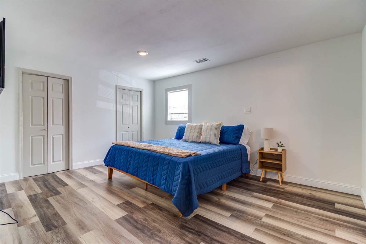 Master bedroom w/ King size bed 