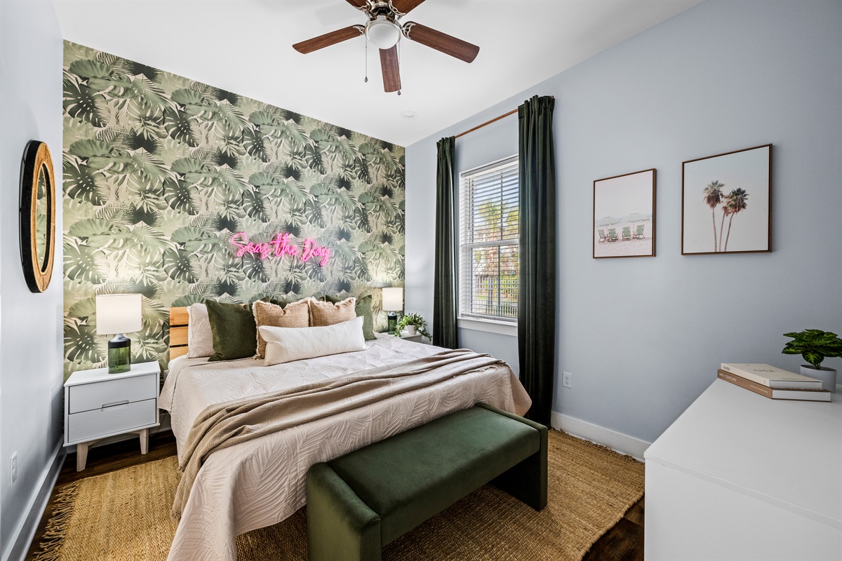 Seas the day. This cozy beach-inspired bedroom is perfect for unwinding after a full day of sun, sand, and pool time.