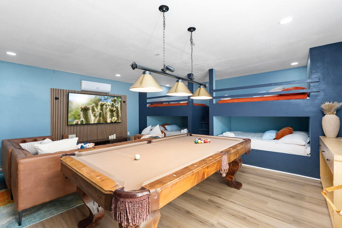 Custom bunk game room with pool table.