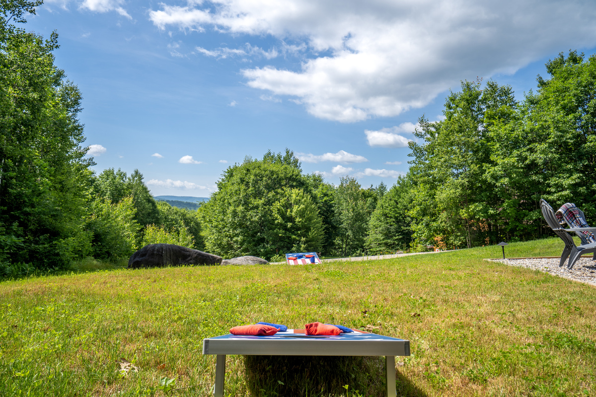 Add a little extra entertainment to your getaway with a classic game of cornhole for all ages.