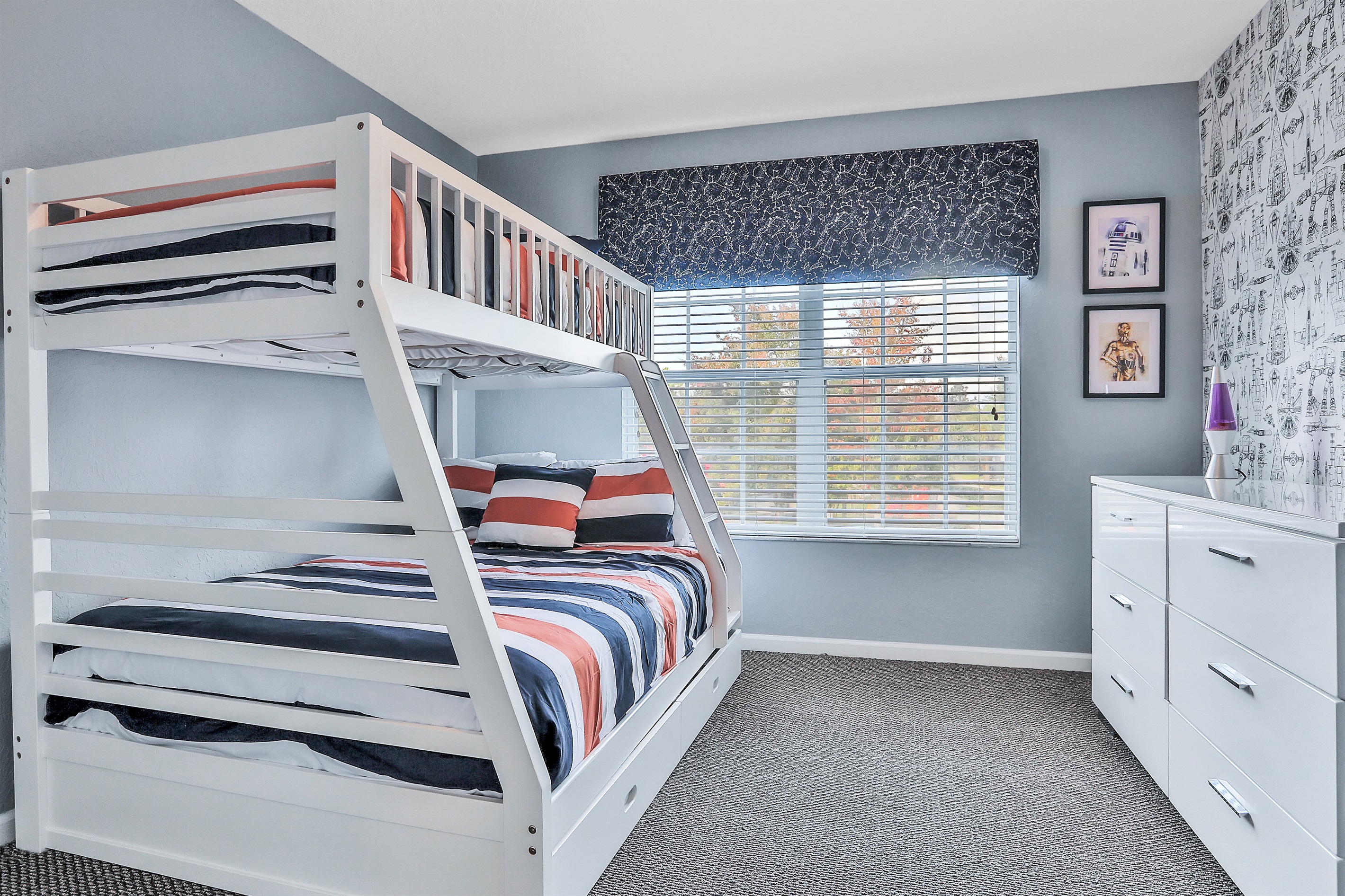 Star Wars bunkroom for the kids, with a trundle and 43" Smart TV. Now with luxury vinyl flooring.