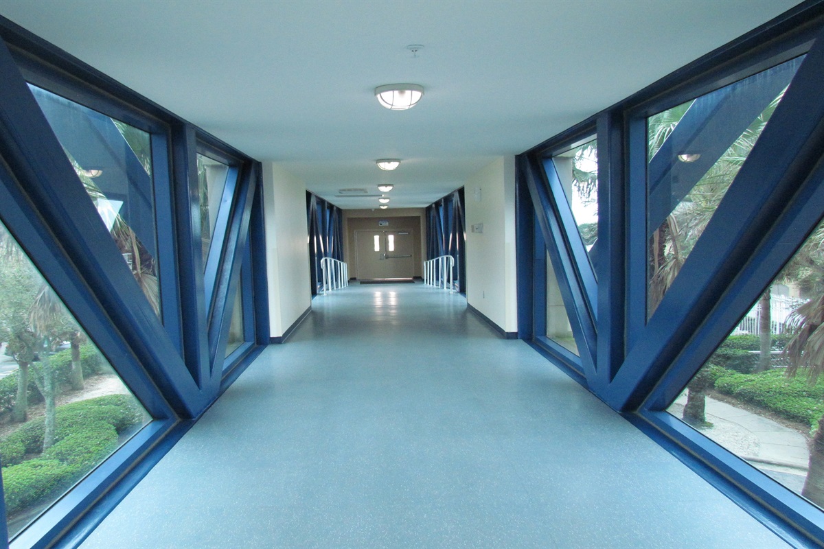 The signature amenity of Crystal Tower: a private, elevated, and air-conditioned bridge connecting you directly to the beachfront pool and sugar-white sands. Convenience and luxury, redefined.