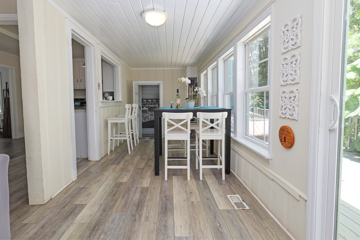 Dining area with hightop seating and pass through bar top seating
