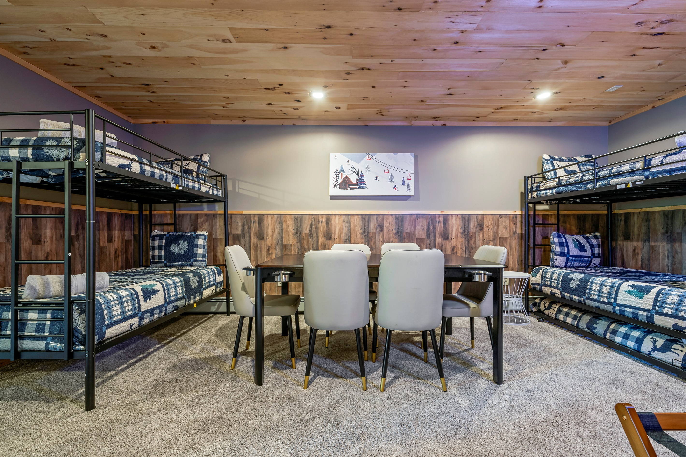 Downstairs bunk beds offer a comfortable and playful space for extra guests and little adventurers.
