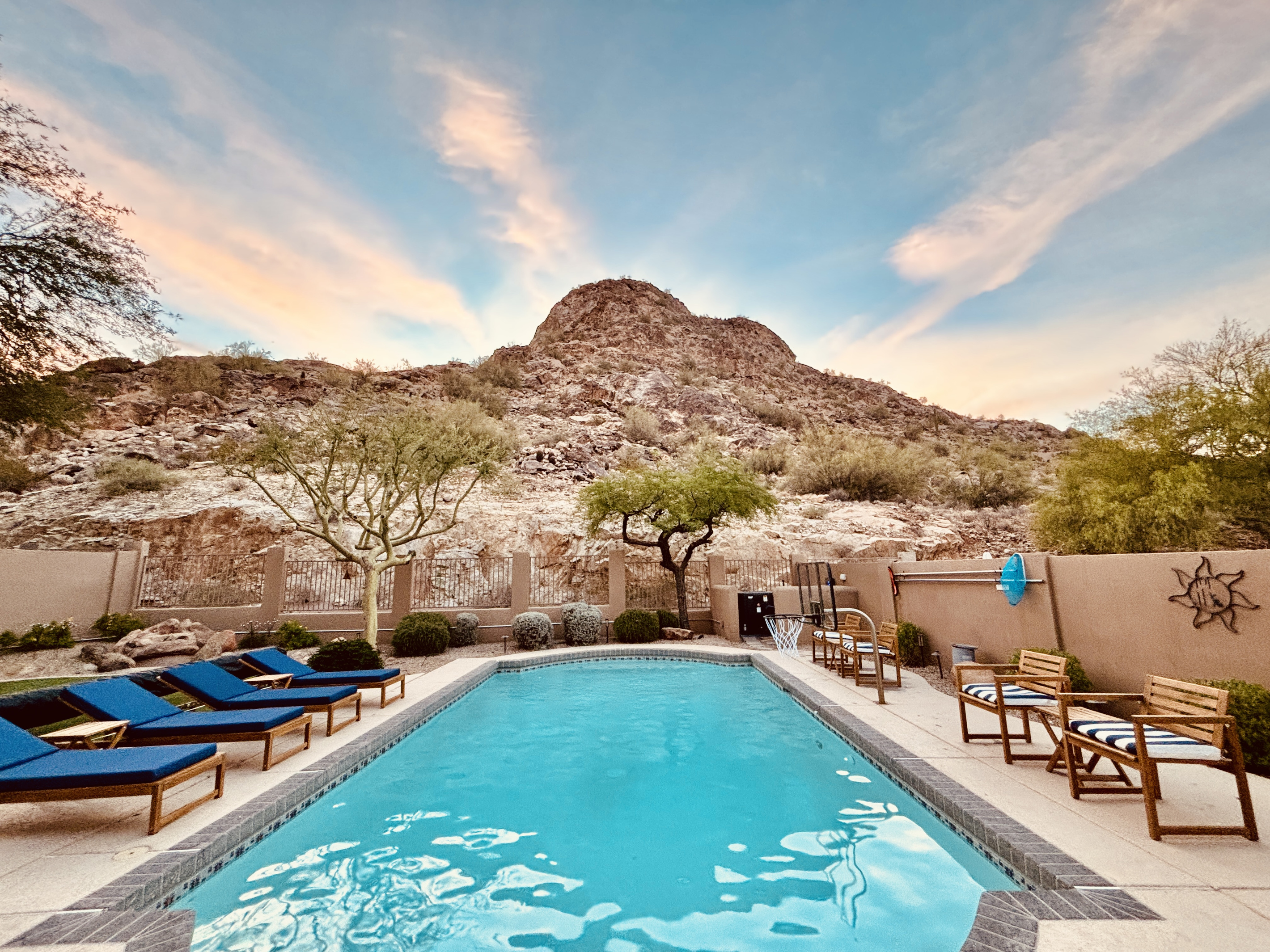 Backyard at sunrise. The sun rises over the mountain.
