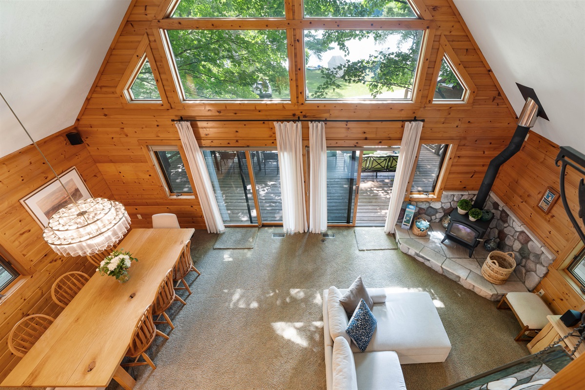 Enjoy the lofted ceilings of this lakefront chalet, offering unobstructed views and amazing sunsets.