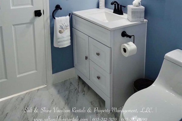 First floor 3/4 bathroom from kitchen leading into first floor bedroom!