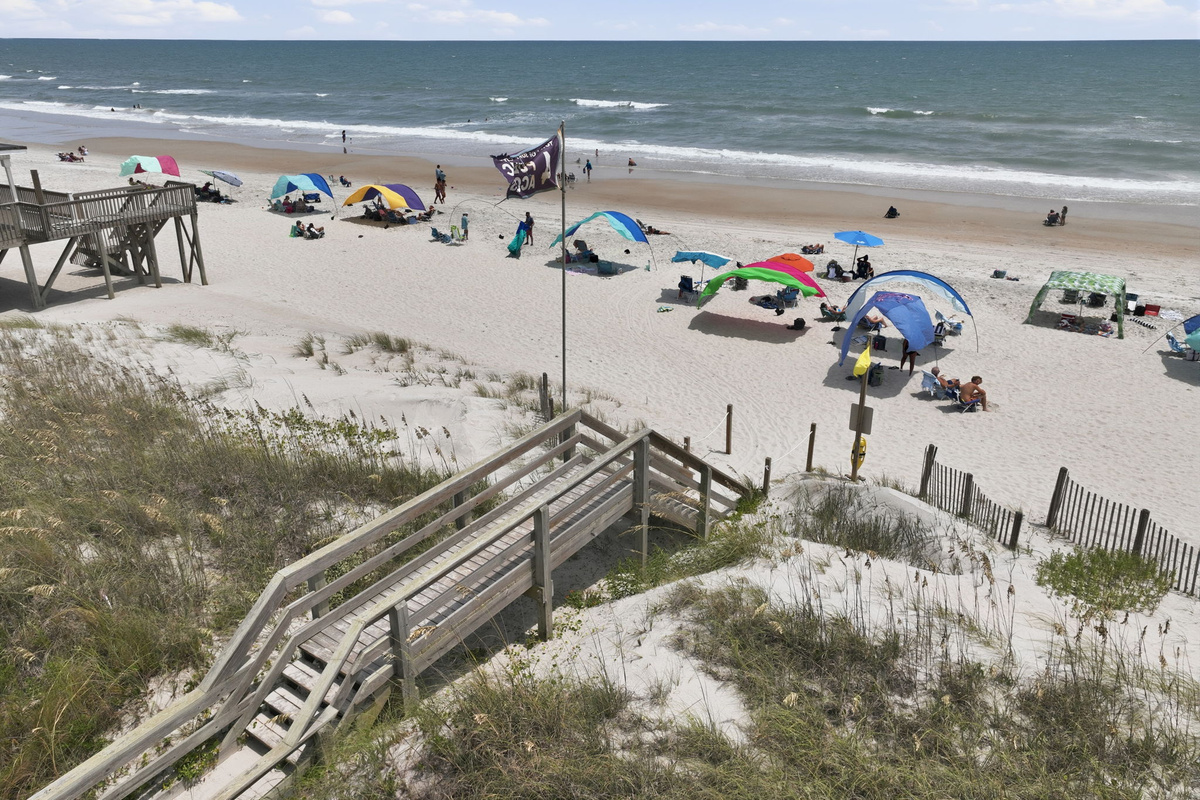 Spend your days on the beautiful shores of Surf City with beach access just a short 300-yard walk from the home!