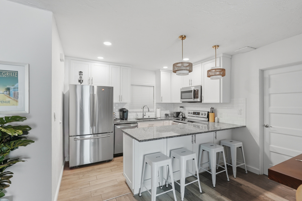 Fully equipped with modern appliances and essential cookware, the kitchen makes preparing meals easy&mdash;whether you're enjoying your morning coffee or cooking dinner after a day by the water.