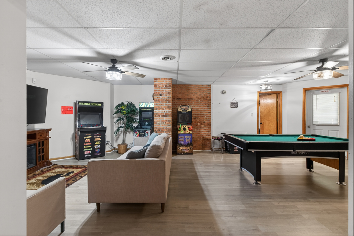Game Room: Enjoy endless fun with pool, retro arcade games, and a comfy lounge area!