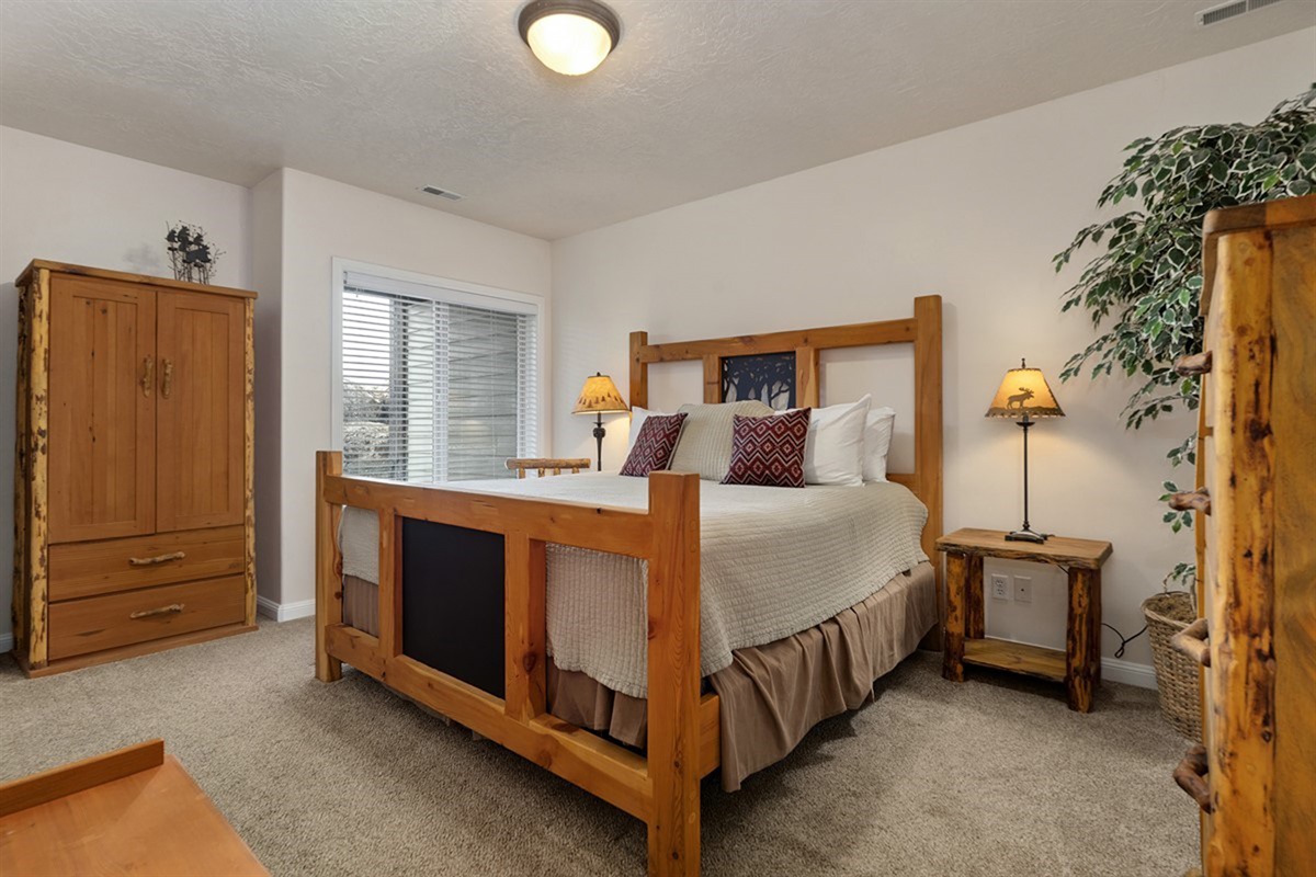 Comfortable and inviting bedroom with another king bed, perfect for additional guests.