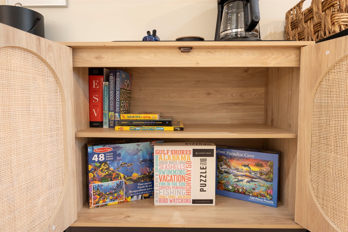 A cozy collection of puzzles, games, and reads perfect for relaxing after a day at the beach.