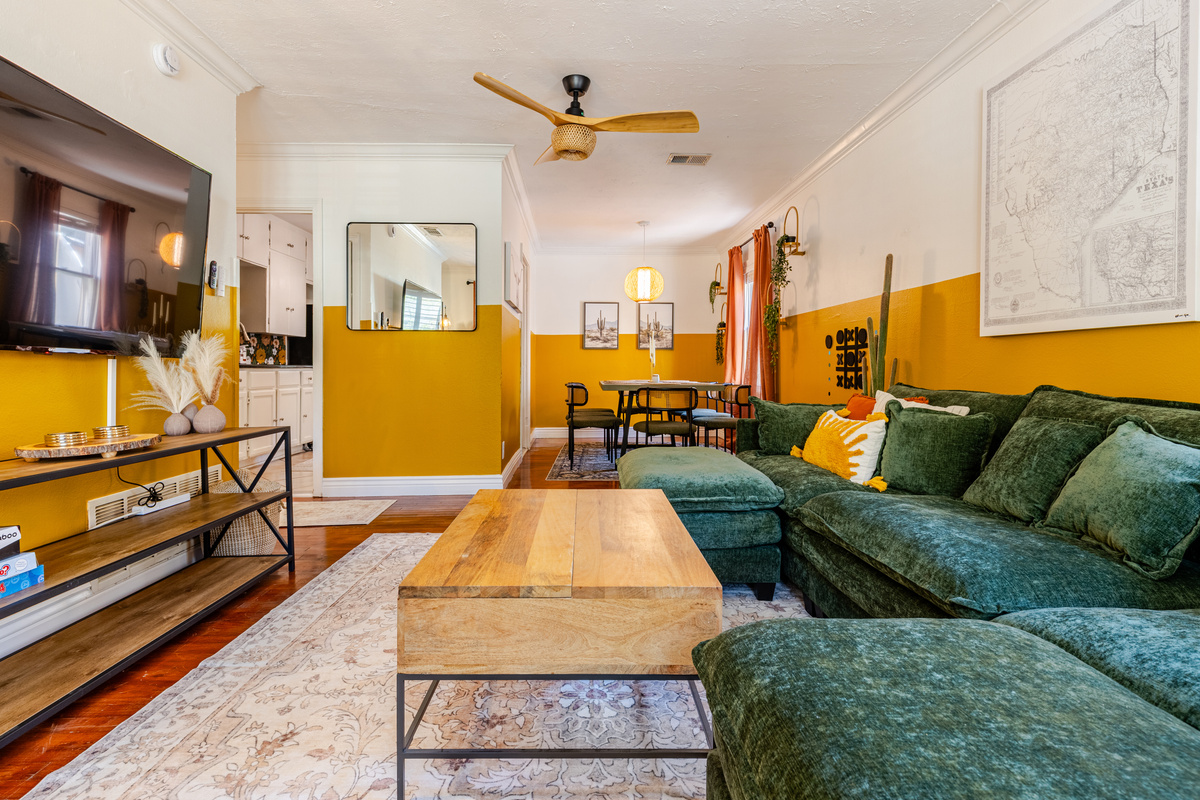 Vibrant colors and plush seating create a perfect gathering spot for relaxation.