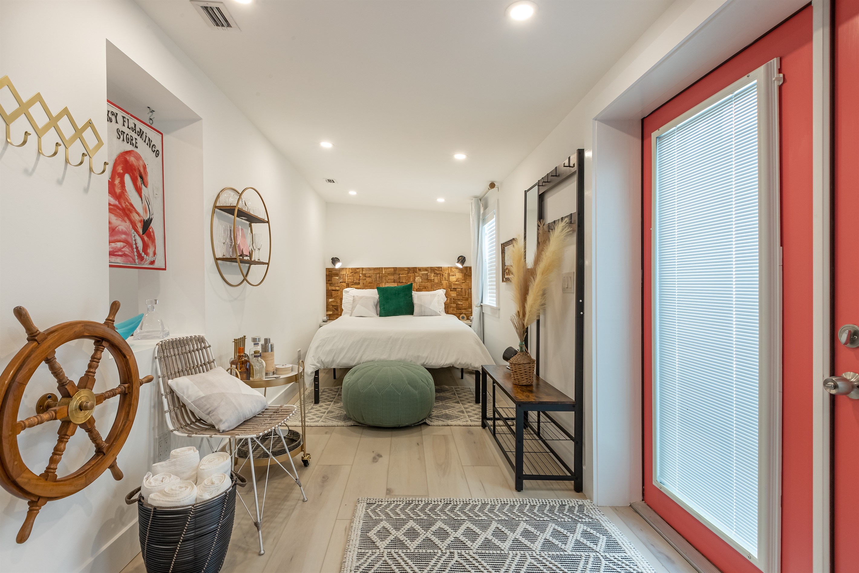 Charming Retreat: Bright room with rustic decor and vibrant doors, perfect for your island getaway!